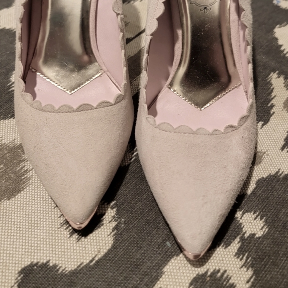 Ted Baker heels that are a light cream pink color. Very soft pump material.